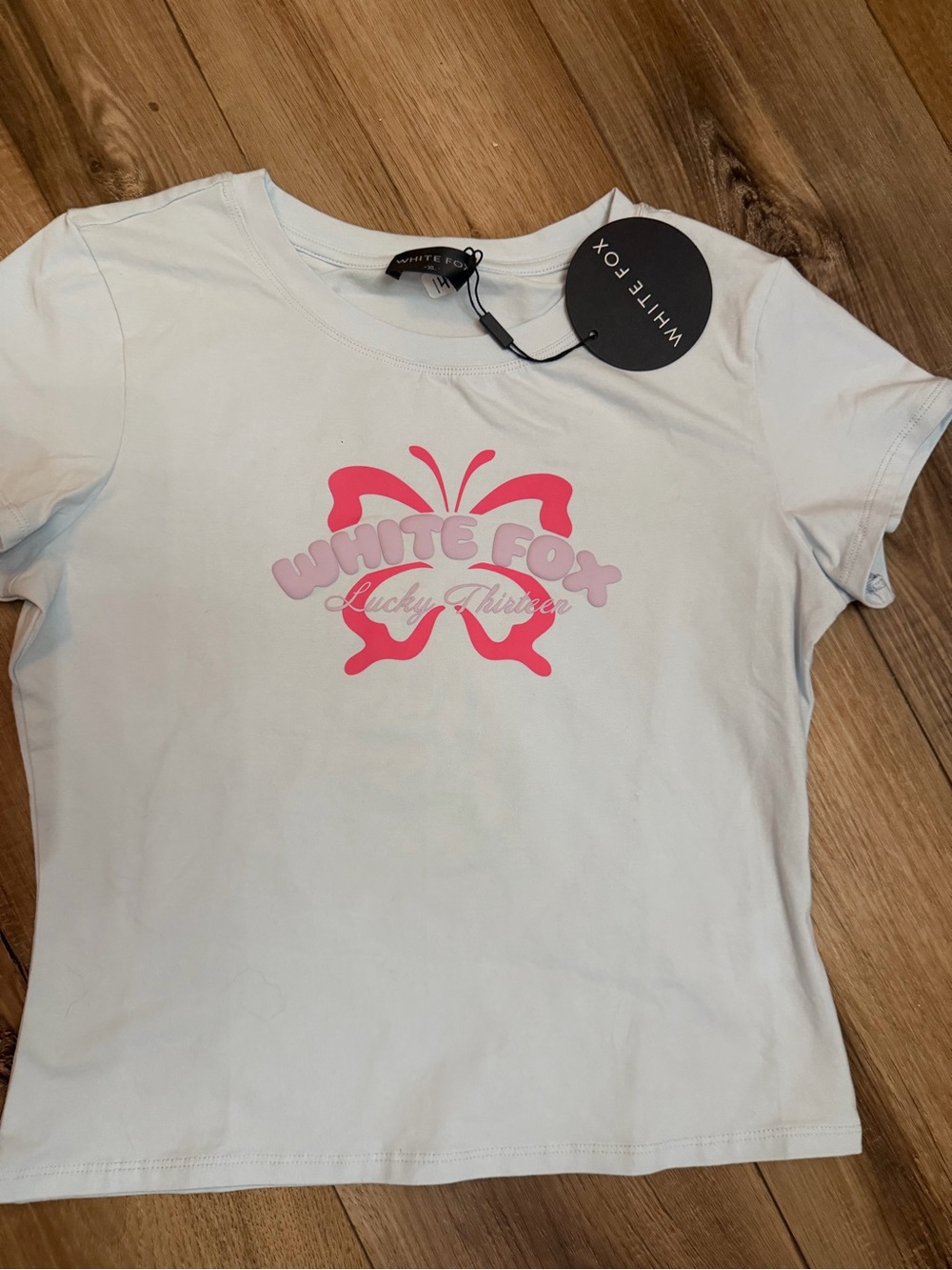White Fox Boutique Light Blue Tee with Pink Butterfly Logo